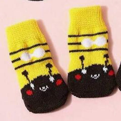 Pair of yellow and black small dog's socks with cartoon face design