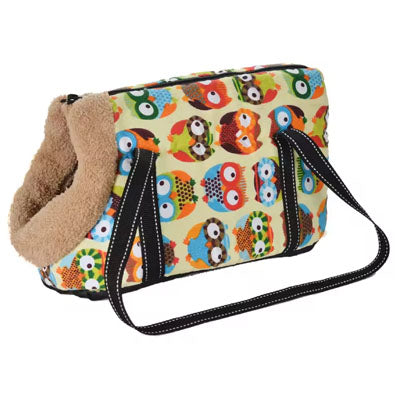 Pet carrier with owl pattern on a beige background